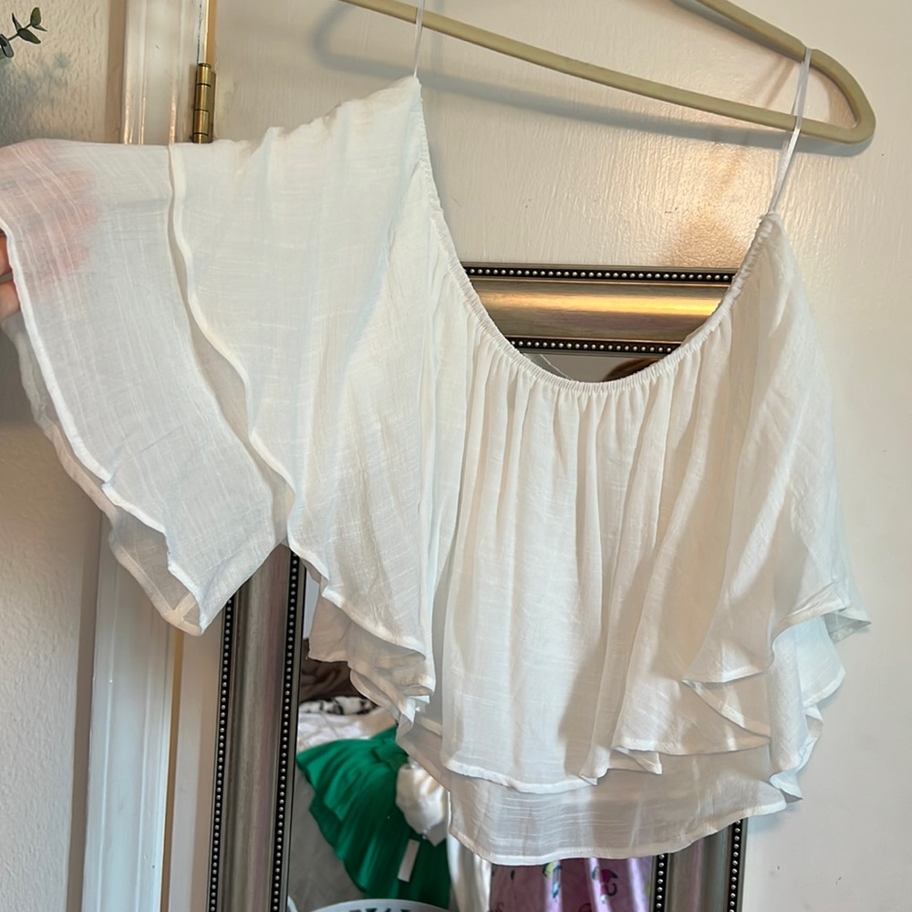 White set. Off the shoulder top with flowy pants